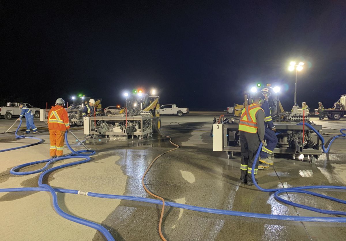 Three saws producing slots before self-contained vacuum trailers came online